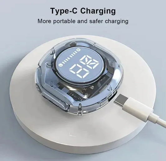 Transparent wireless earbuds case with LED display charging via Type-C cable on white round platform