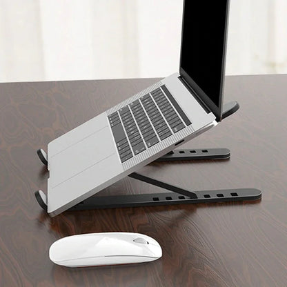 Sunehri Store adjustable laptop stand with laptop and wireless mouse on desk