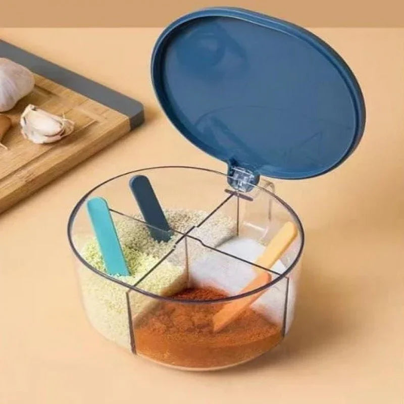 sunehri store round spice box with compartments, colored spoons, and blue lid on kitchen counter