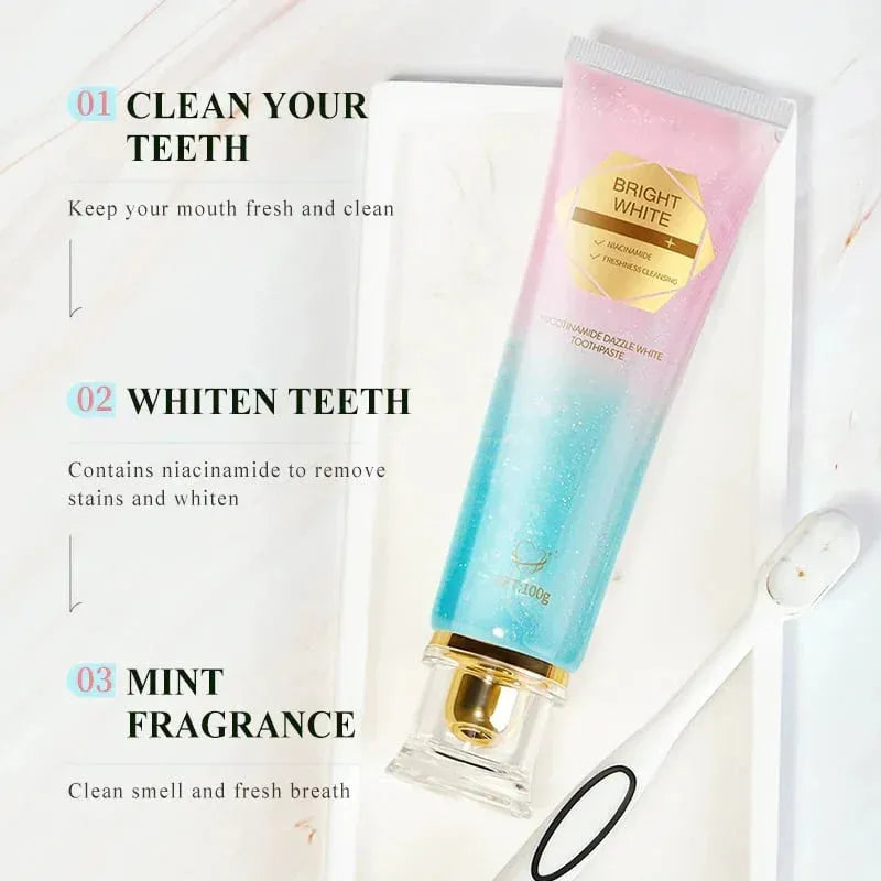 Bright White niacinamide toothpaste tube in pink and blue gradient with toothbrush on white surface
