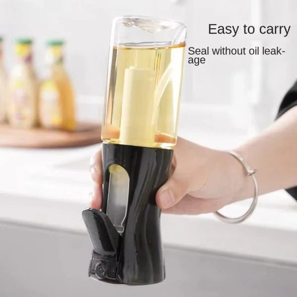 Hand holding Sunehri Store edible oil spray bottle with black handle in a kitchen