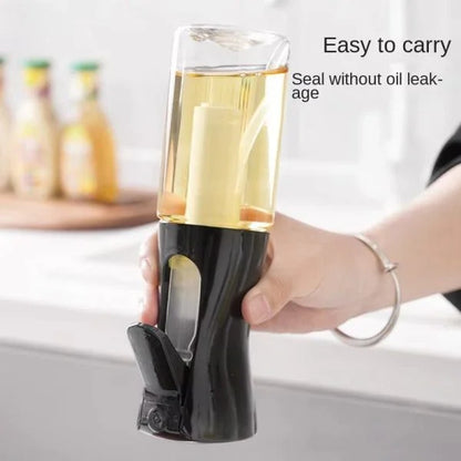 Hand holding Sunehri Store edible oil spray bottle with black handle in a kitchen